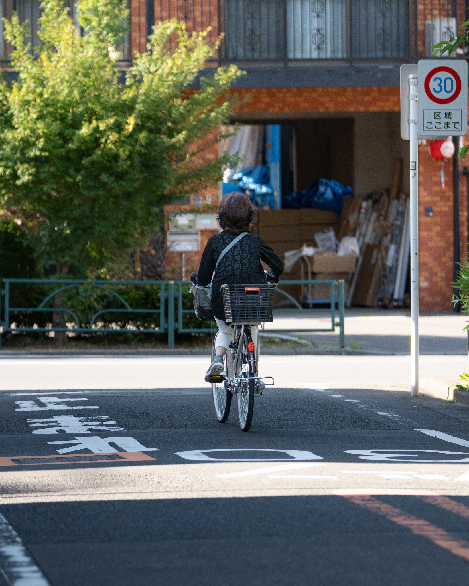 Candid street photograph, frame 10 of 14